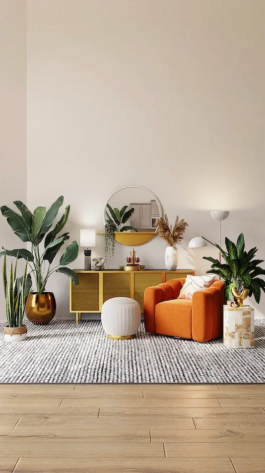 Miroir rond entouré de plantes et d'un fauteuil rouge orangé 1 place